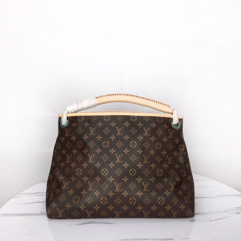 Close-up detail of modern statement women's handbag – women's luxury accessory