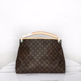 Close-up detail of modern statement women's handbag – women's luxury accessory