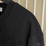 Flat lay presentation of Givenchy luxury clothing with logo-detail design