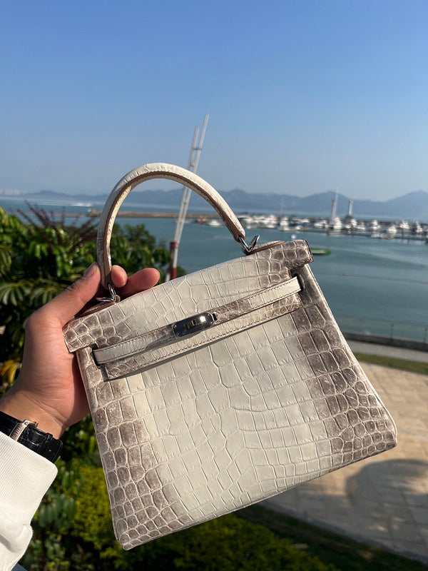 Side view of modern structured handbag