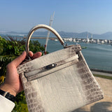 Side view of modern structured handbag