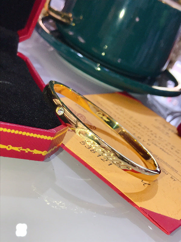 Close-up detail view of Cartier unisex jewelry piece