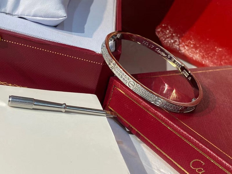 Close-up detail view of Cartier unisex jewelry piece