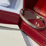 Close-up detail view of Cartier unisex jewelry piece
