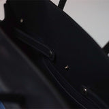  Understated everyday bag carried on shoulder