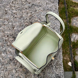 Side view of minimalist structured handbag