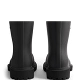 Close-up of Balenciaga boots hardware and fine stitching