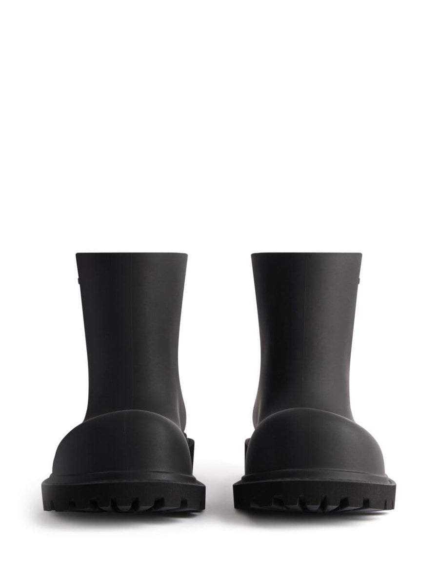 Balenciaga boots lifestyle shot premium designer piece
