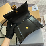 Styled lifestyle shot of modern polished women's handbag – women's premium purse