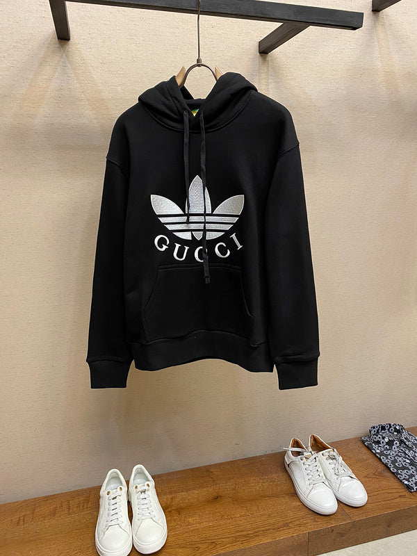 Front view of Gucci luxury clothing with label-forward styling