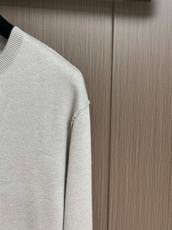 Full styled look of Louis Vuitton luxury clothing with signature branding