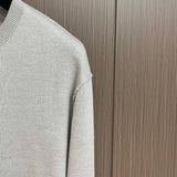 Full styled look of Louis Vuitton luxury clothing with signature branding