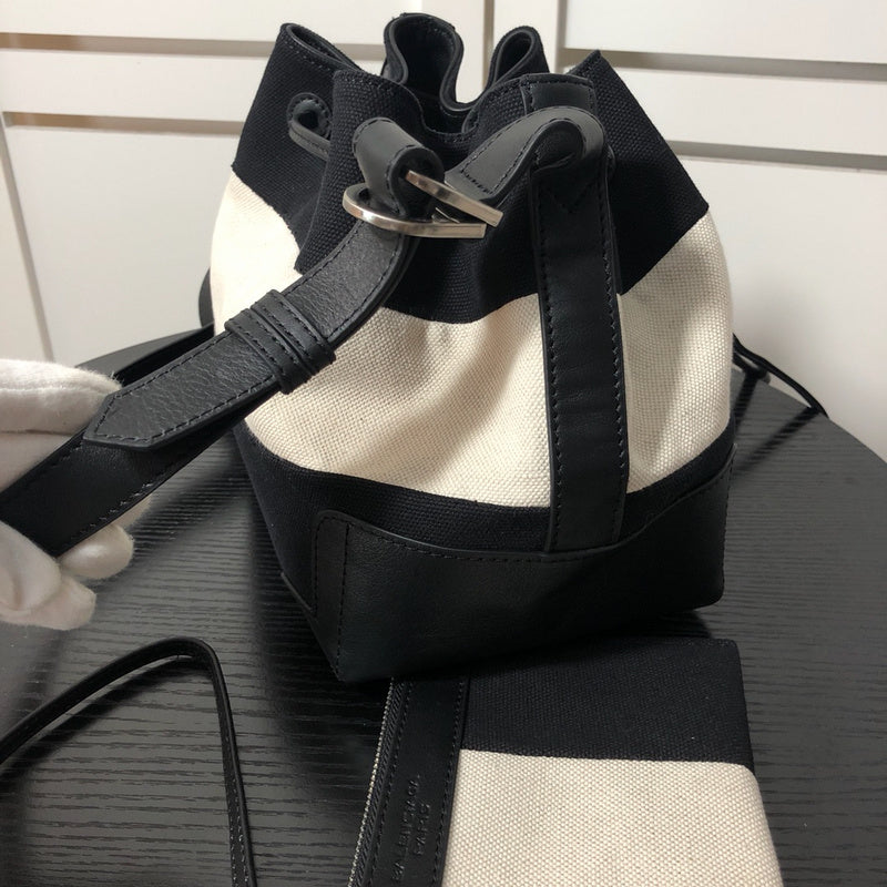 Styled lifestyle shot of refined signature women's handbag – women's statement bag