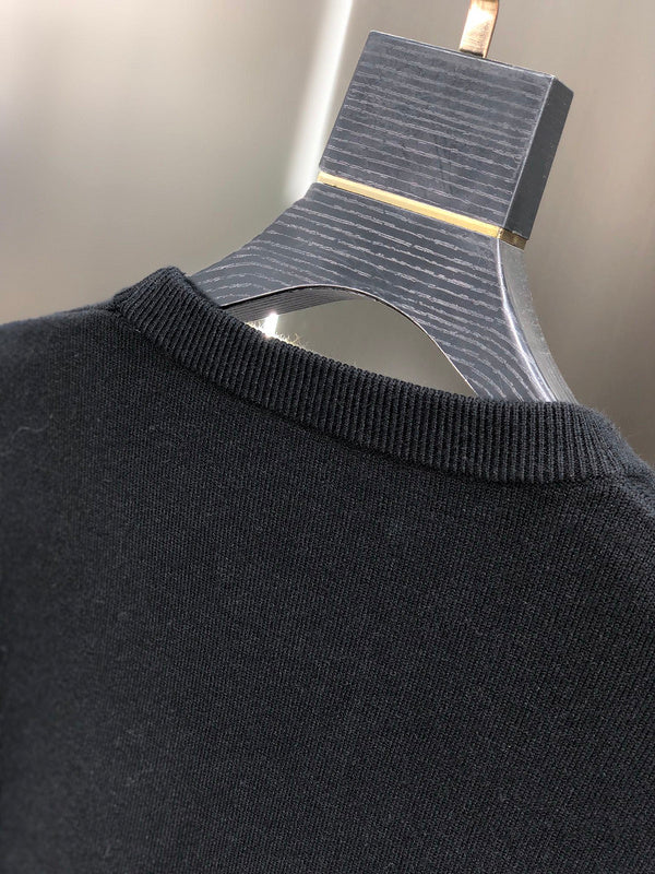Side profile of Louis Vuitton luxury clothing with tailored silhouette