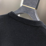 Side profile of Louis Vuitton luxury clothing with tailored silhouette