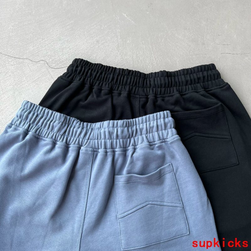 Side profile of Rhude luxury clothing with logo-detail design