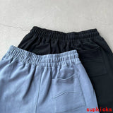 Side profile of Rhude luxury clothing with logo-detail design