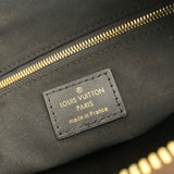 Side profile of signature everyday-luxe women's handbag – women's luxury accessory