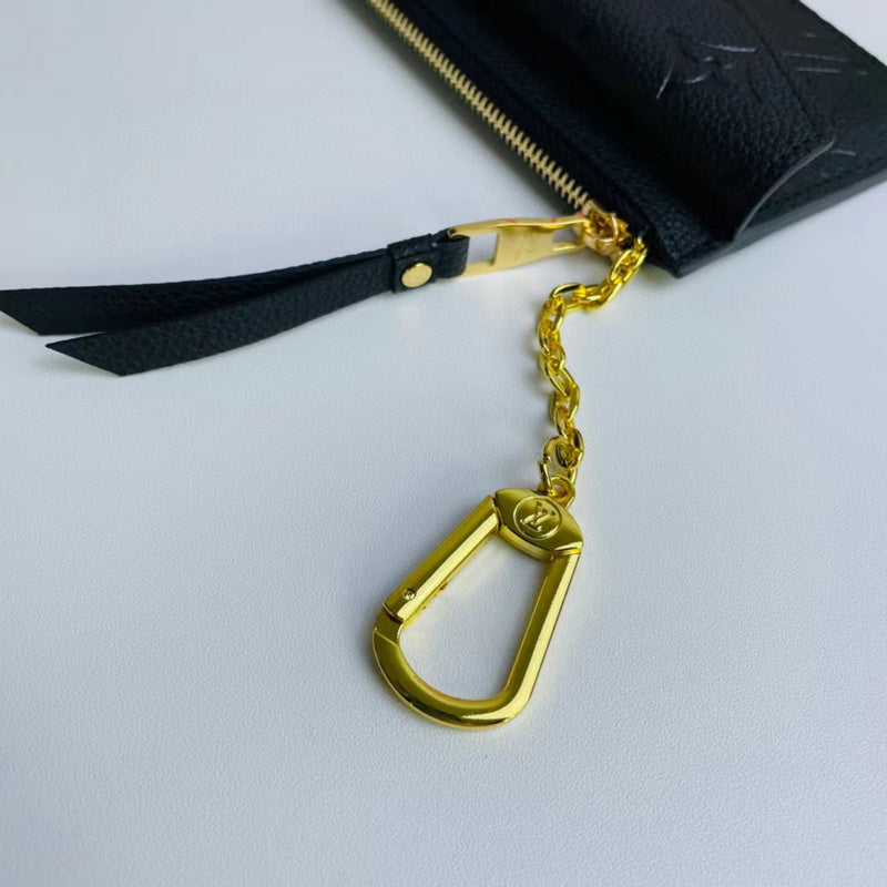 Handle and strap detail of polished sleek women's handbag – women's luxury accessory