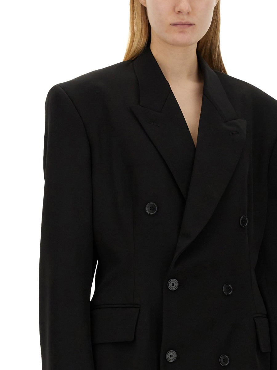 Close-up of Balenciaga outerwear hardware and fine stitching