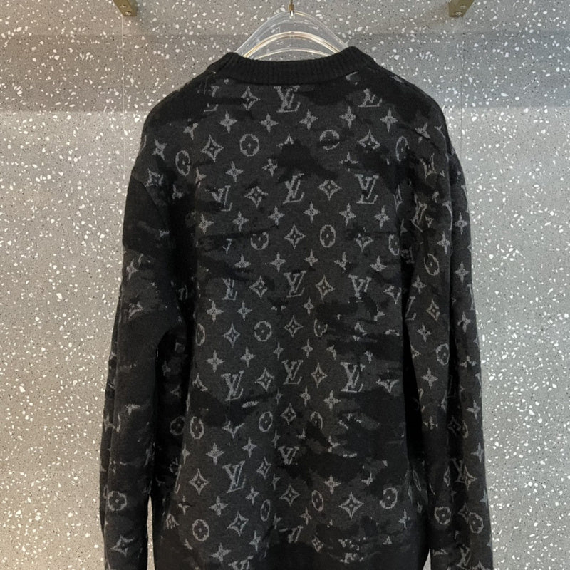 Front view of Louis Vuitton luxury clothing with label-forward styling