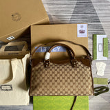 Front view of polished refined women's handbag – women's luxury handbag