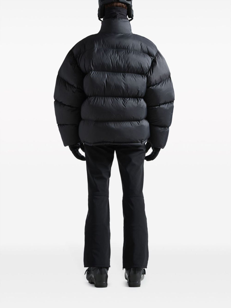 Close-up of Balenciaga pants hardware and fine stitching