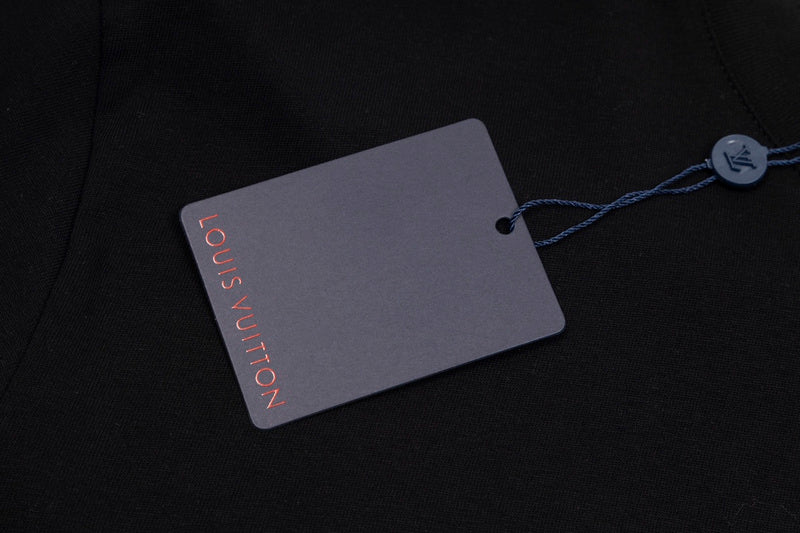Flat lay presentation of Louis Vuitton cotton t-shirt with monogram-inspired silhouette