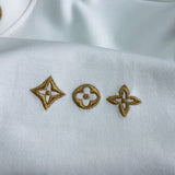 Front view of Louis Vuitton luxury clothing with everyday silhouette