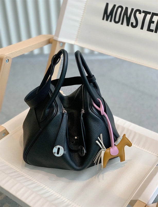  Timeless carryall bag carried on shoulder 16