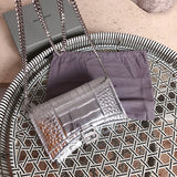 Close-up detail of polished everyday-luxe women's handbag – women's designer-style accessory