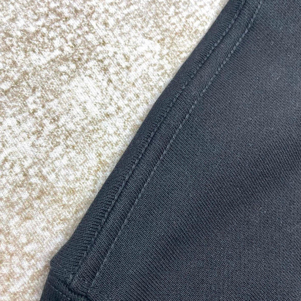 Three-quarter angle view of Amiri luxury piece style No.091