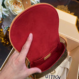  Tailored satchel carried on shoulder 10