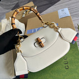 Back view of chic signature women's handbag – women's statement bag