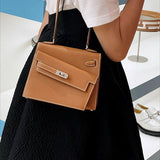Side view of sculpted structured handbag