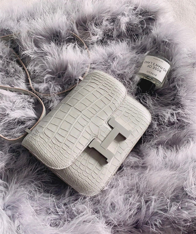 Side view of minimalist structured handbag