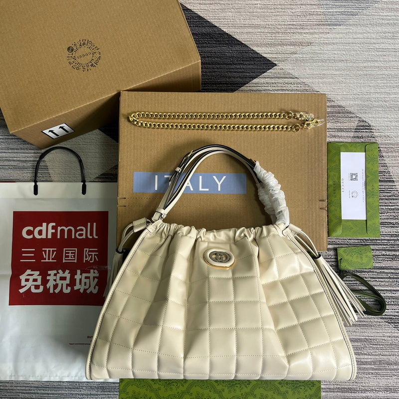 Front view of chic signature women's handbag – women's statement bag