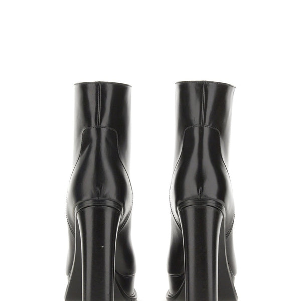 Close-up of Alexander McQueen boots & booties hardware and fine stitching
