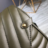 Handle and strap detail of modern chic women's handbag – women's designer-style accessory