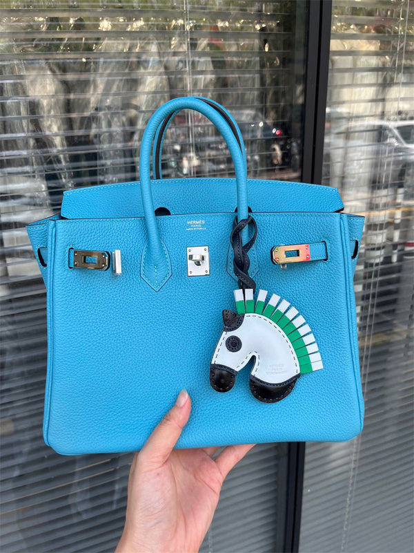 Side view of refined structured handbag