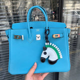 Side view of refined structured handbag