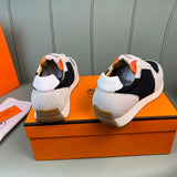 Hermès Grey Bow-Detail Flats - Angled View
