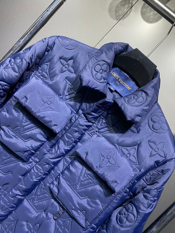Close-up detail shot of Louis Vuitton luxury clothing with label-forward styling