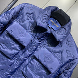 Close-up detail shot of Louis Vuitton luxury clothing with label-forward styling