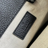 Side profile of polished structured women's handbag – women's luxury handbag
