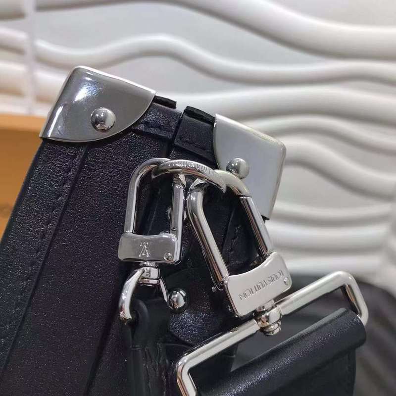 Handle and strap detail of signature classic women's handbag – women's statement bag