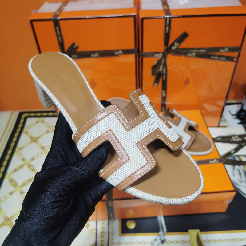 Hermes sandals Style 049 - front view, refined designer finish