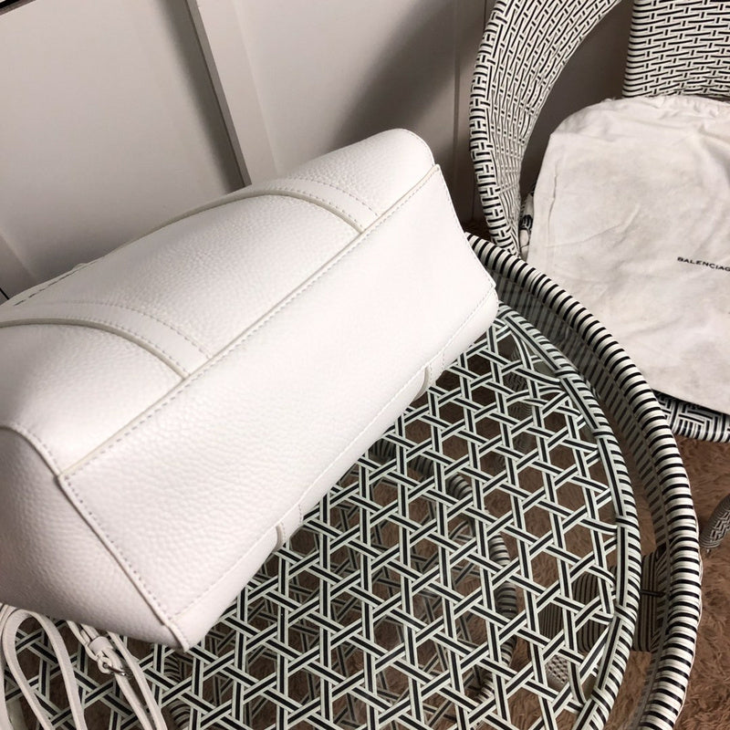 Styled lifestyle shot of structured elevated women's handbag – women's designer-style accessory