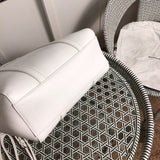 Styled lifestyle shot of structured elevated women's handbag – women's designer-style accessory
