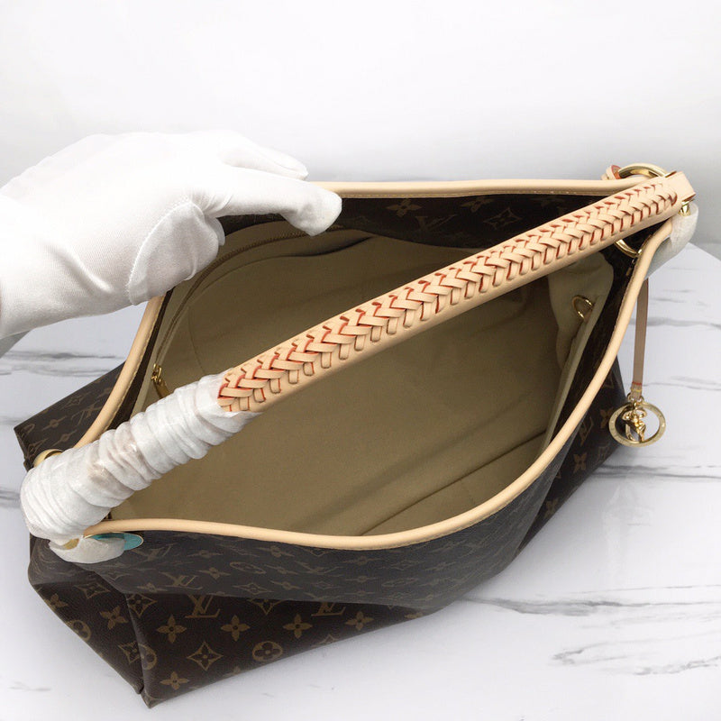 Back view of modern statement women's handbag – women's luxury accessory
